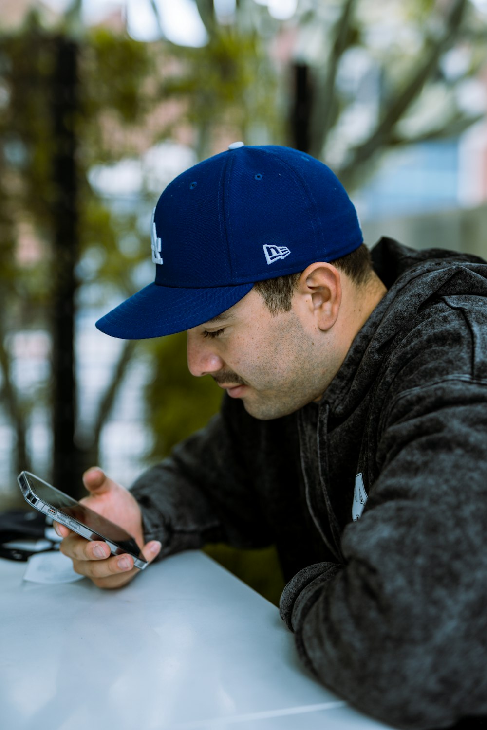 a man looking at his phone