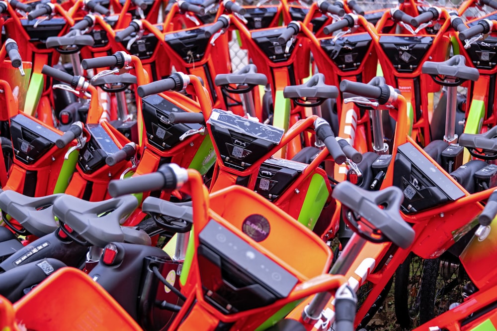 a group of orange and black chairs