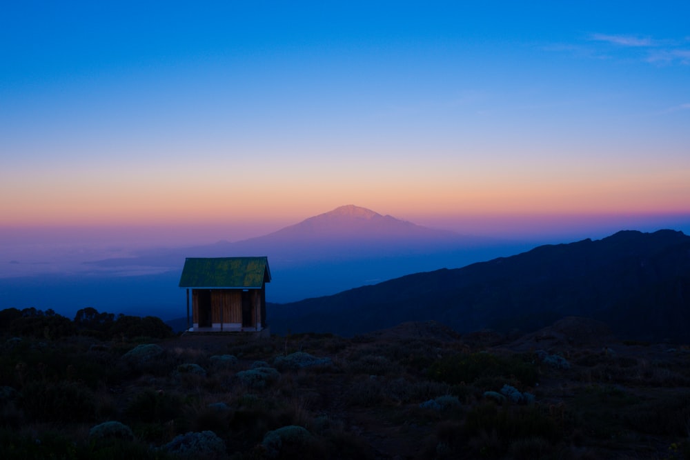 a small shack in a field