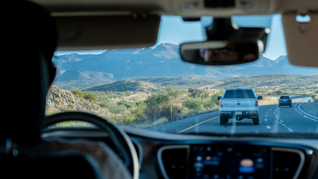 a car driving on a road,