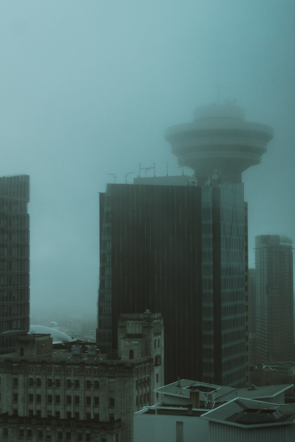 a city skyline with a large explosion