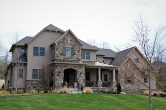 A beautiful family home with a large porch and garden.