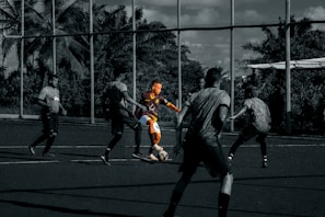 a group of men playing football