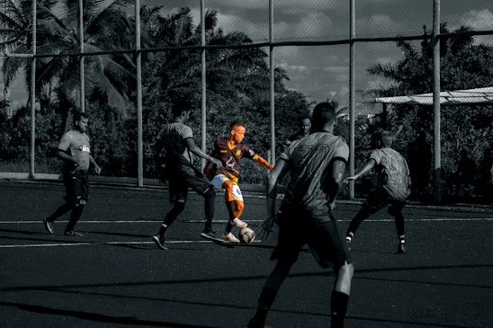 a group of men playing football