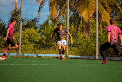 a group of men playing football
