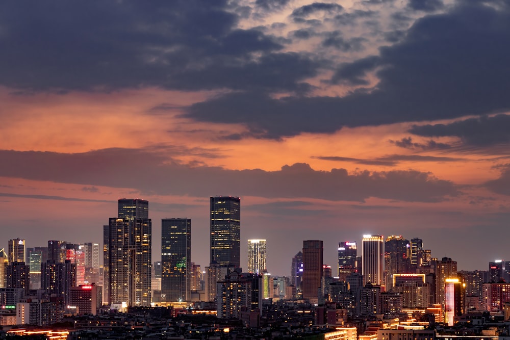 a city skyline at sunset