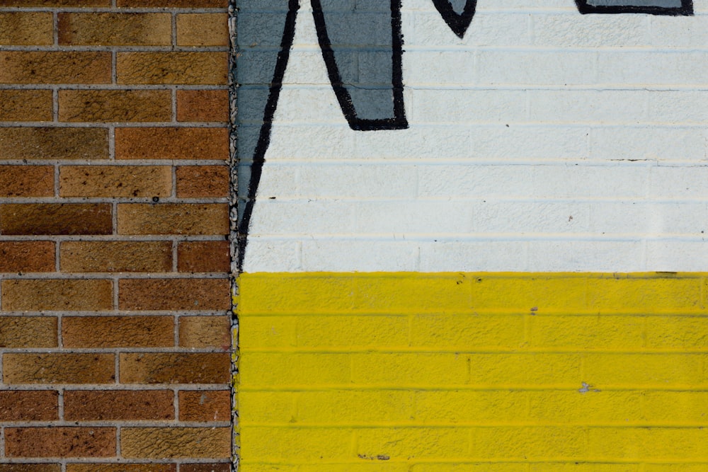 a yellow and white painted wall