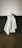 a white dress on a black surface