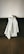 a white dress on a black surface
