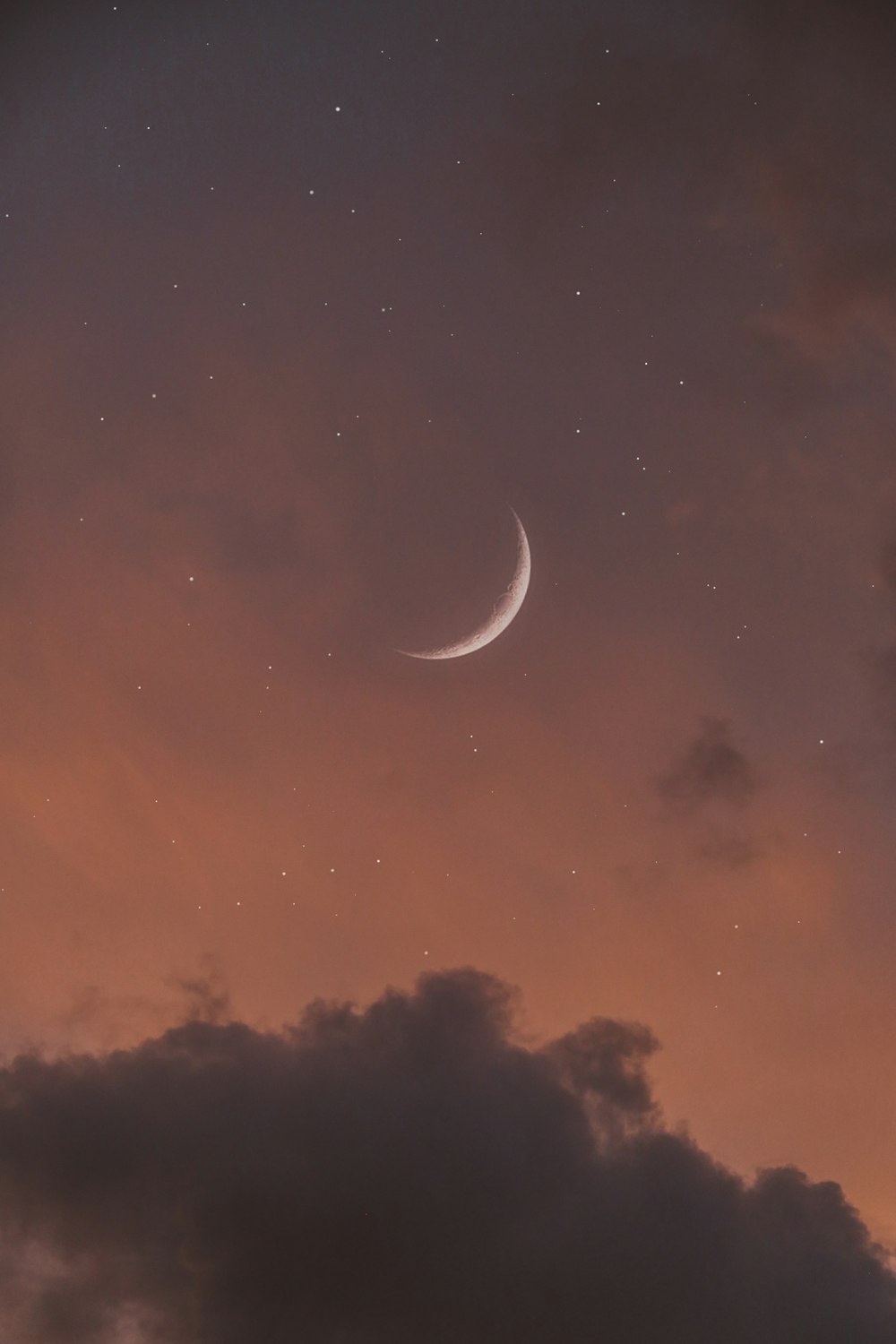 a crescent moon in the sky