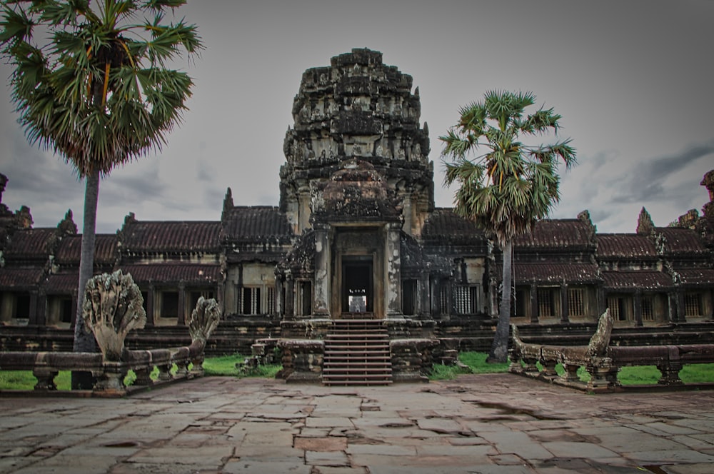 Angkor Wat with statues and trees