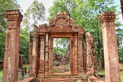 Carved pediment above a library doorway at Banteay Srei (via Unsplash)