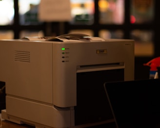 a white printer on a table