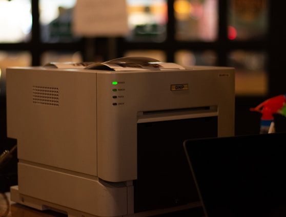 a white printer on a table