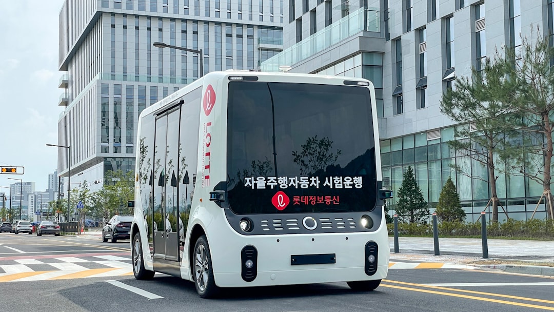 a bus driving down the street,