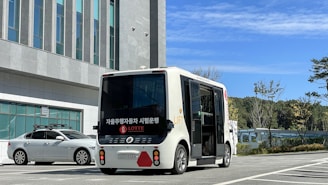 a bus and a car on a road