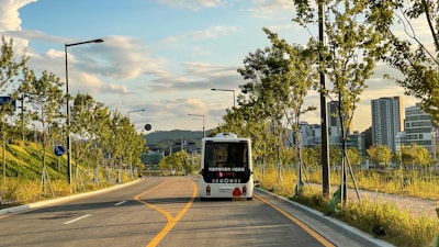 a bus driving down a street
