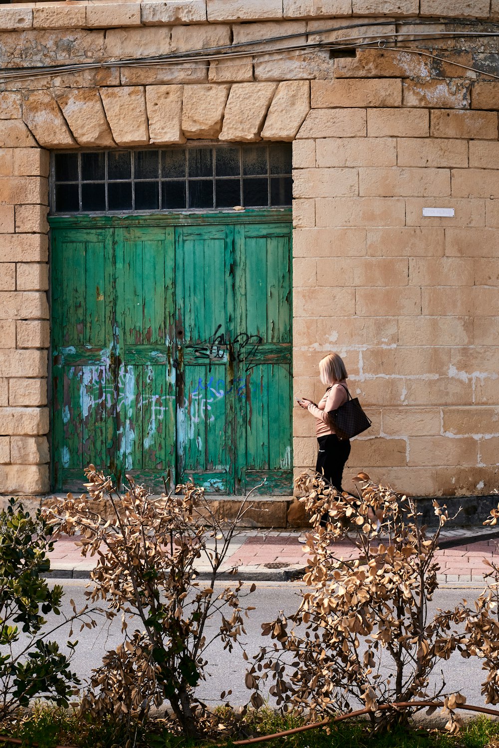 a person standing in front of a building