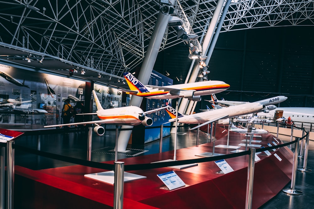 airplanes on display in a museum