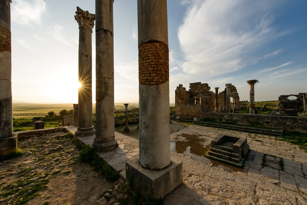 a stone building with pillars