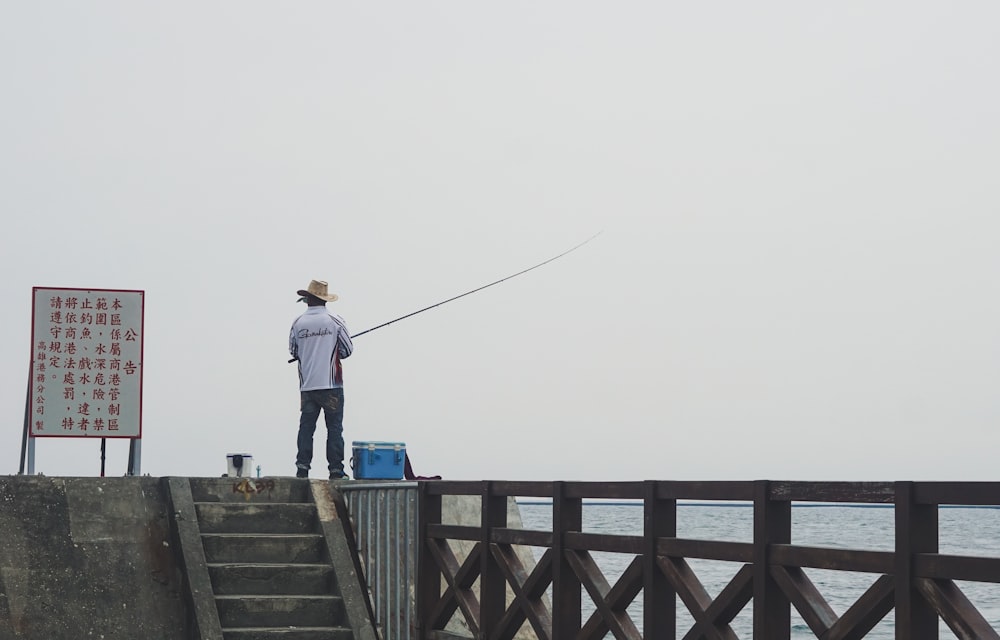 a man standing on a bridge