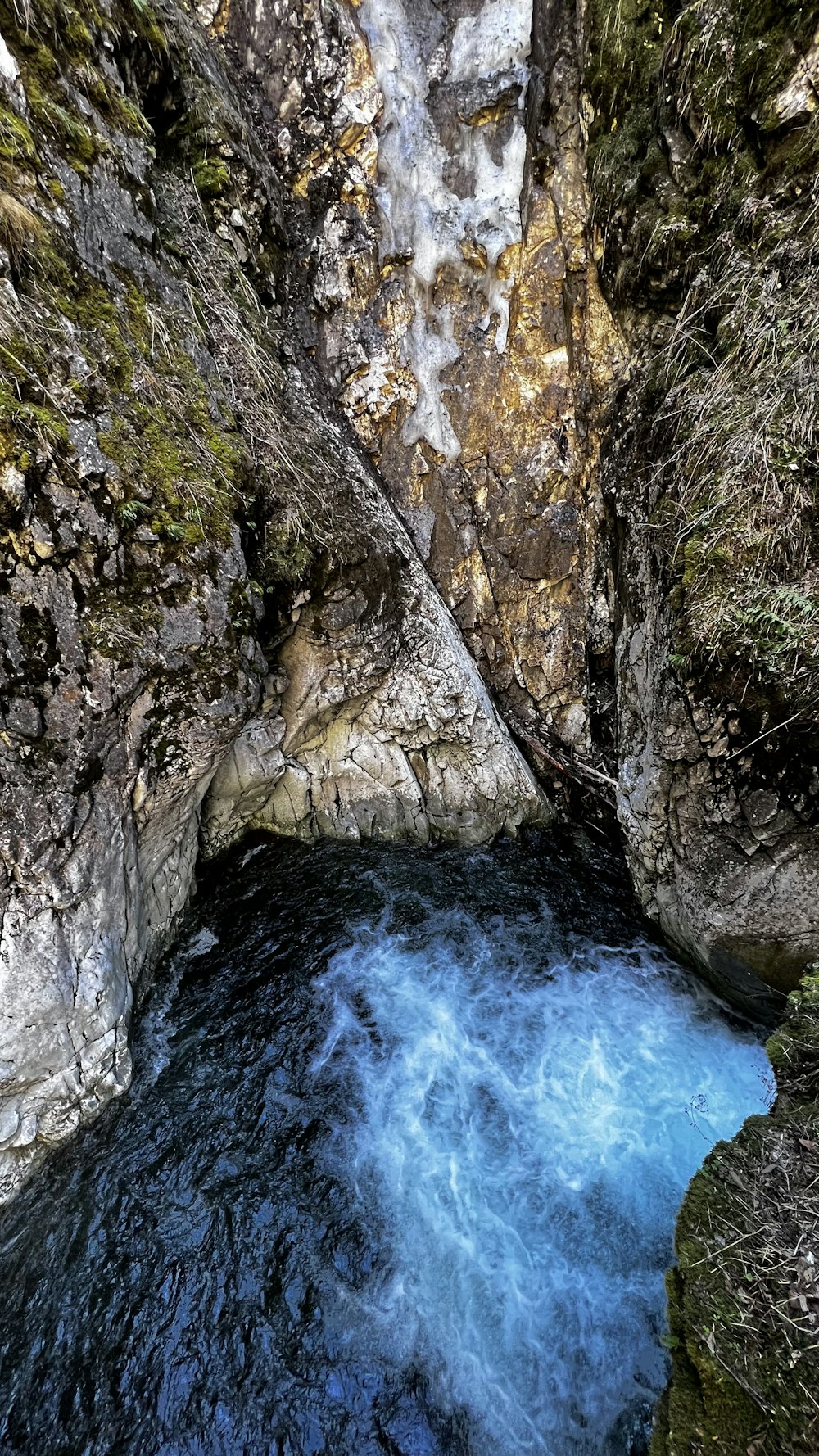 a waterfall in a rocky place