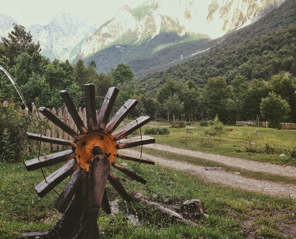 a wooden cross in a field