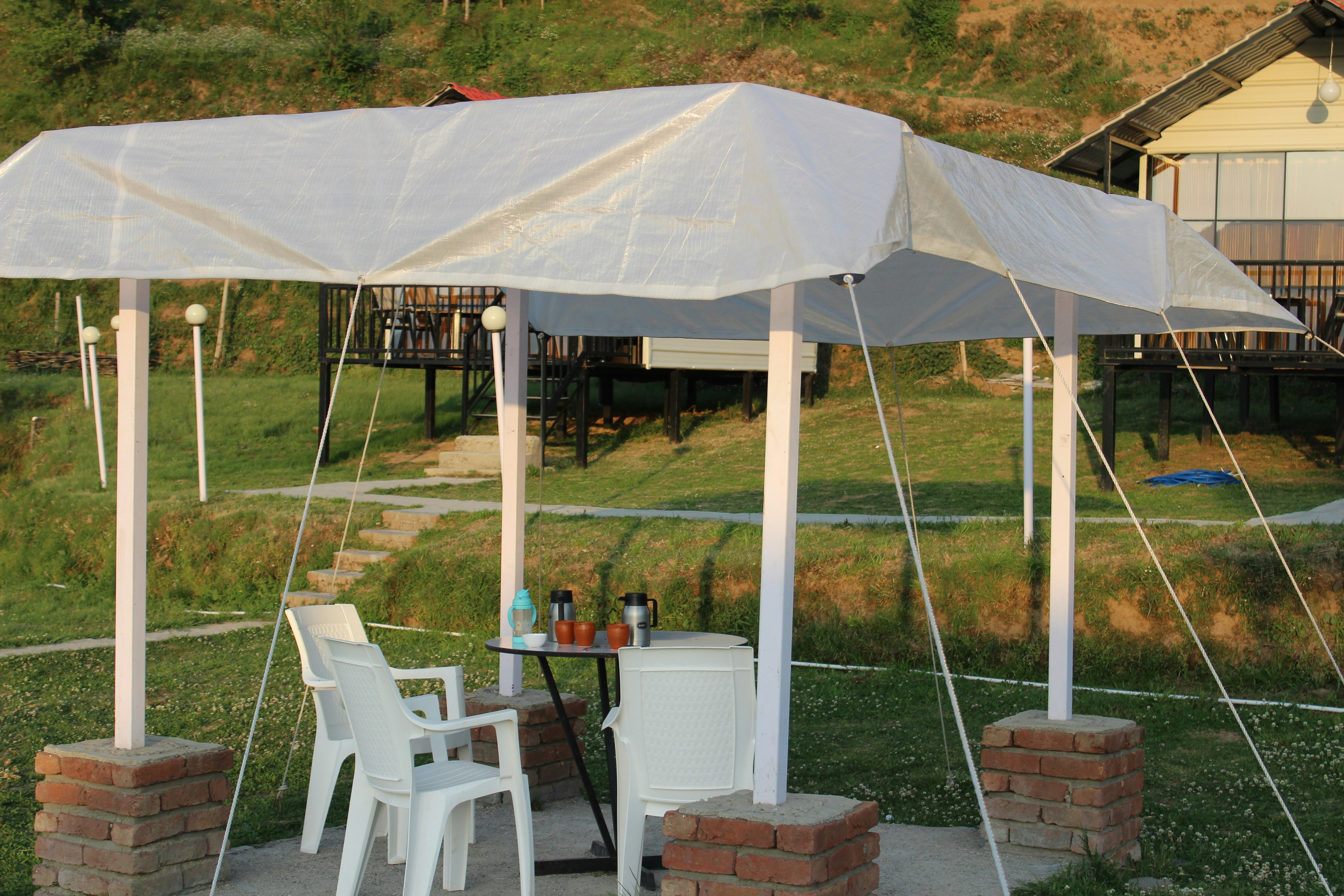 outdoor tented reception setup for a gathering - outside catering for funerals near me