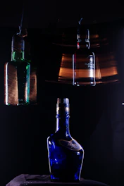 Professional 3D illuminated product shot of Purafuerza desengrasante bottle with dynamic red and yellow lighting.