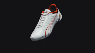 A sleek, modern sports website interface showcasing live scores and trending matches on a dark theme with blue and red accents.