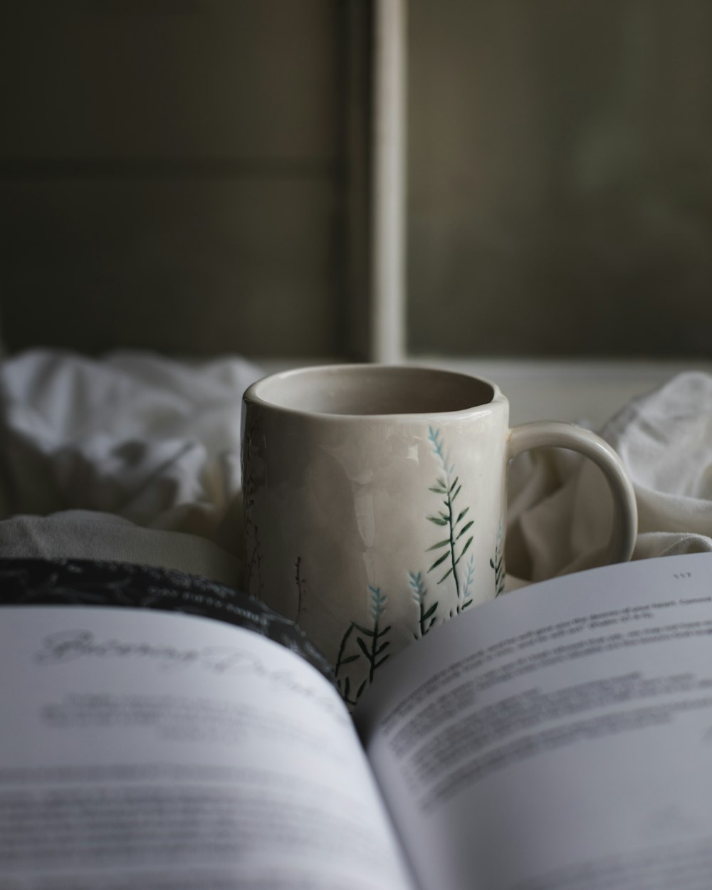 a mug on a book
