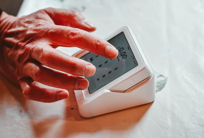 Finger on a biometric attendance reader