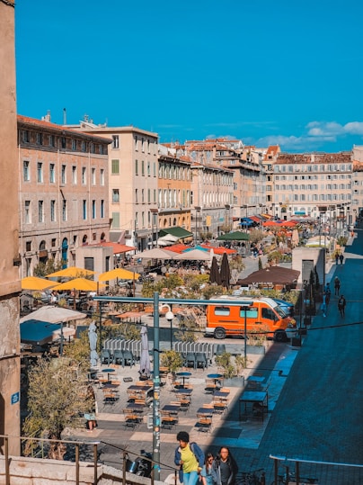 a city with a river and a bus