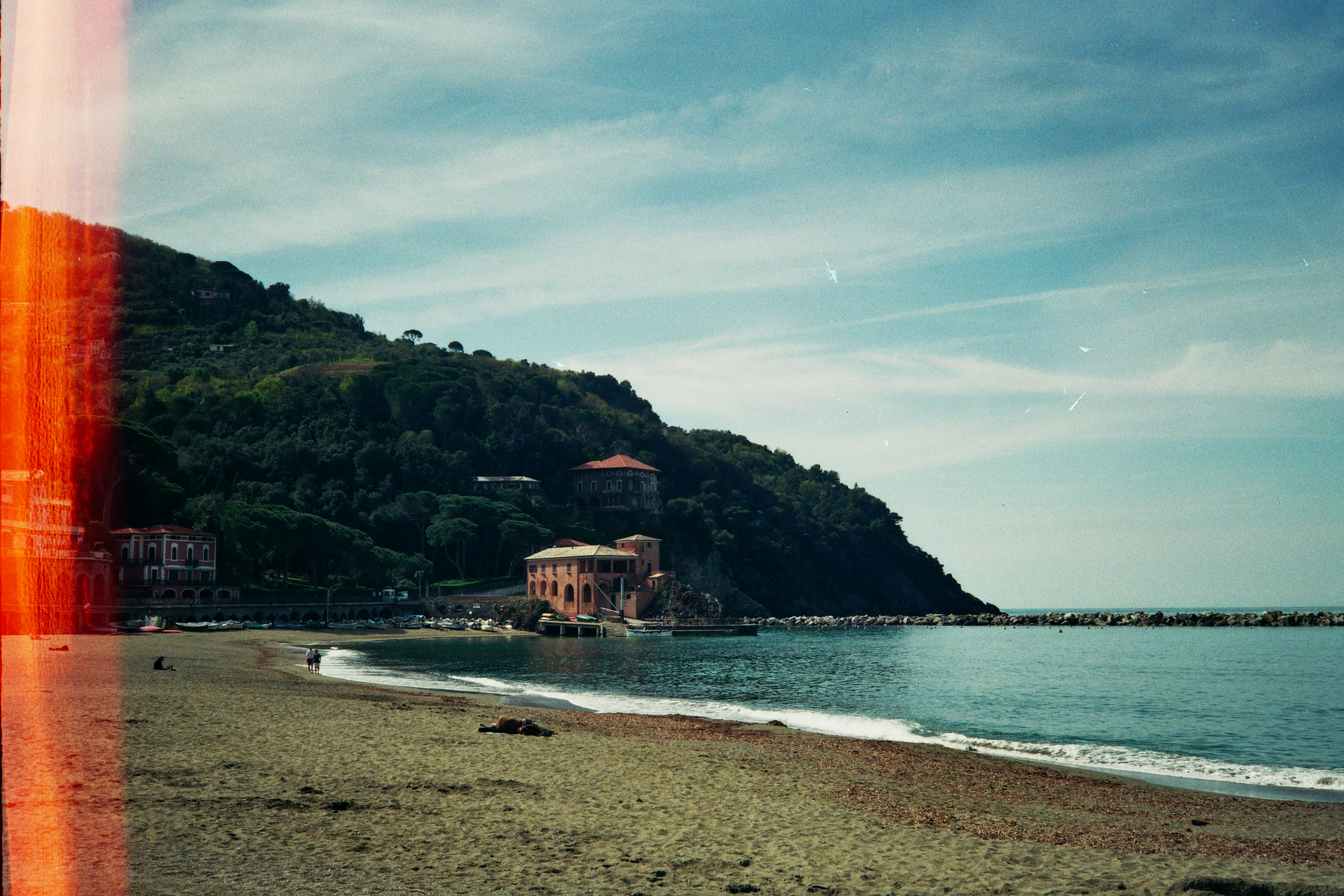 a beach with a building on it