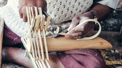 a person cutting wood