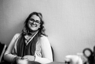 a woman wearing glasses