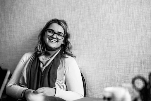 a woman wearing glasses