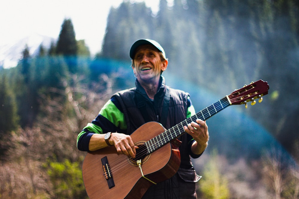 a man playing a guitar