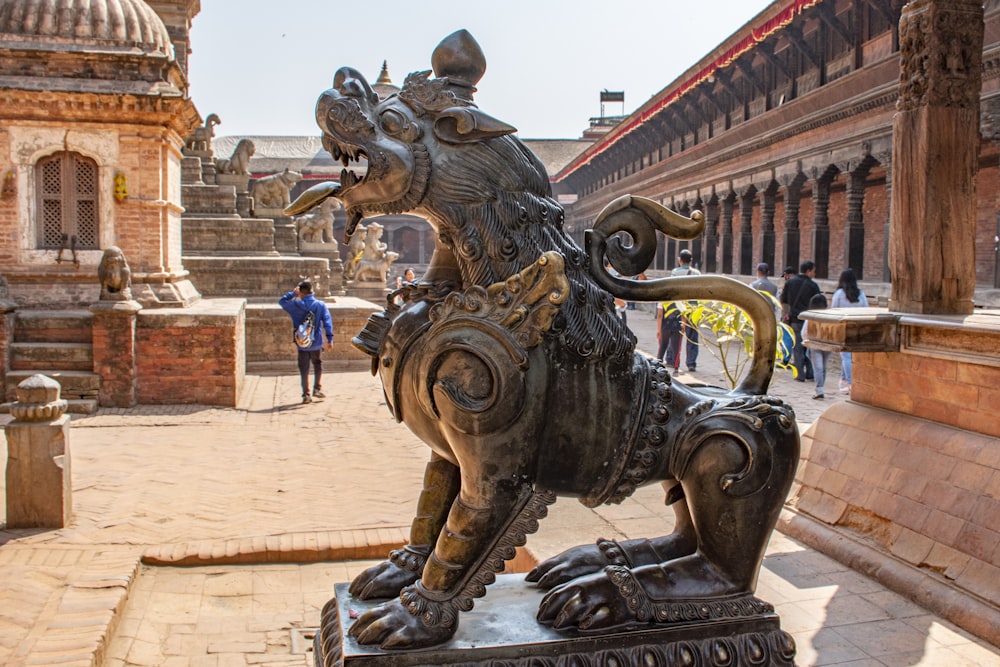 a statue of a person riding a horse