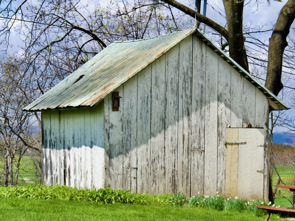 a wooden building with a roof