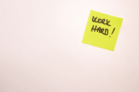 a yellow note with black text