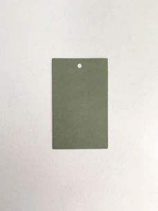A clean, rounded white card on a very light blue background with a placeholder for a circular logo at the top