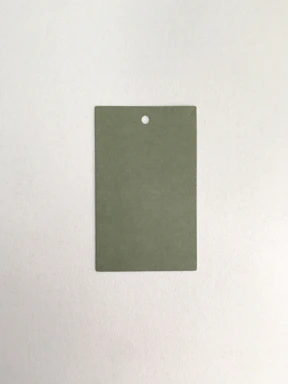 Close-up of a green-accented minimalist fitness card with rounded edges and clean white background.