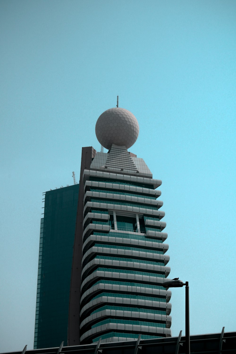a tall building with a round top