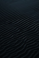 a body of water with ripples