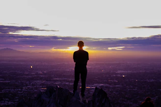 a person standing on a mountain