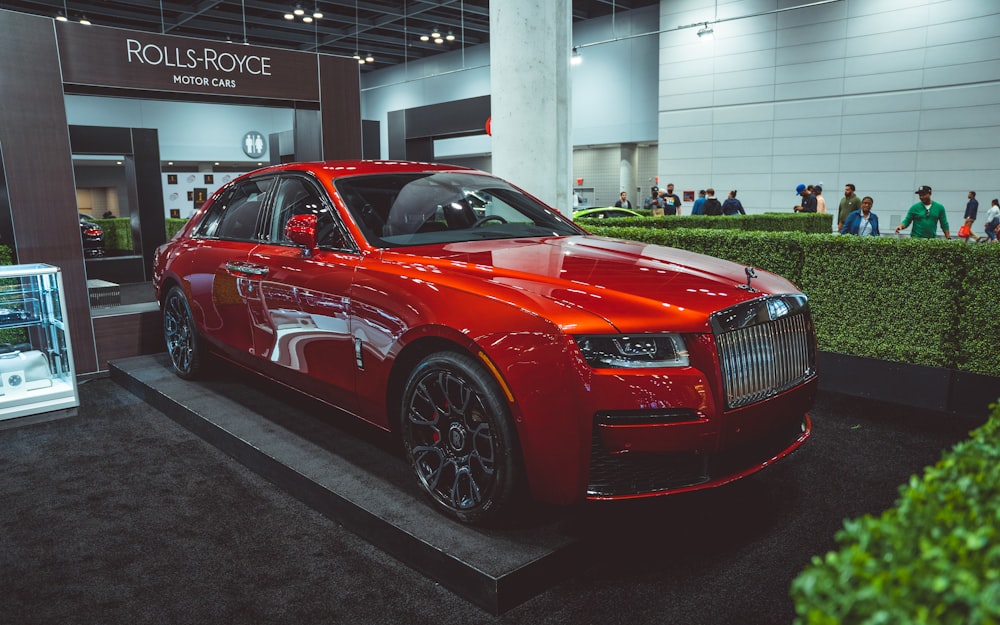 a red sports car parked in a building