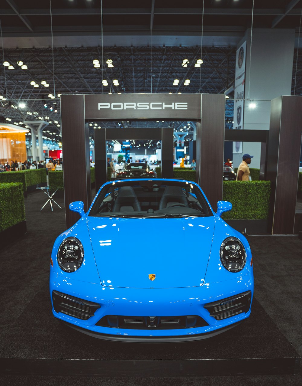 a blue car in a building