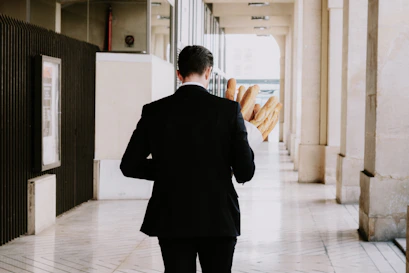 a person carrying bread