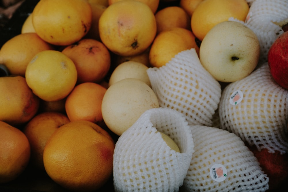 a basket of yellow and white eggs